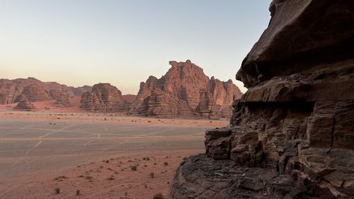 Rock formations in desert against sky