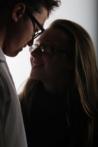 Close-up of couple romancing at home