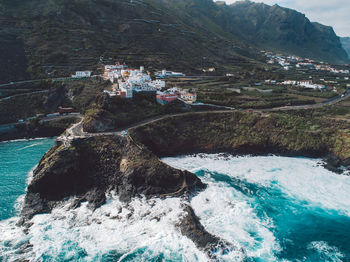 Aerial view of rock formations at seaside