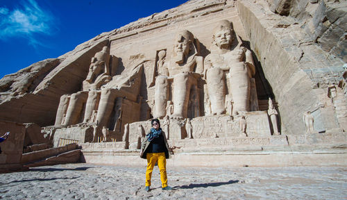 Asian tourist at abu simbel egypt landmark temple of king ramases ii beautiful architecture 