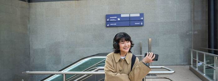 Young woman using mobile phone