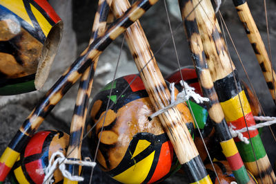 Close-up of multi colored umbrellas on wood