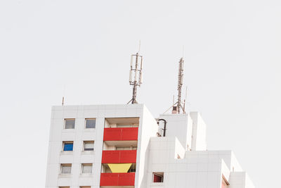 Low angle view of buildings against clear sky