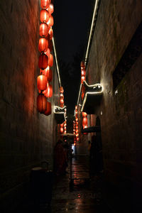 Low angle view of illuminated buildings at night