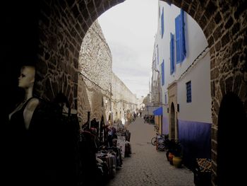 Panoramic view of people on wall of building