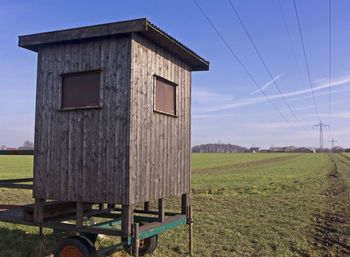 Built structure on field against clear sky