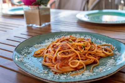 Close-up of noodles in plate on table