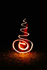 Light painting against black background