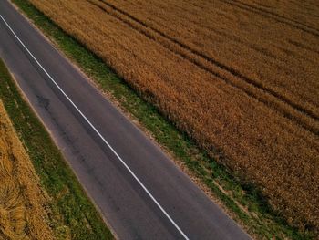 High angle view of road amidst field