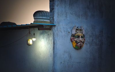 Close-up of stuffed toy against wall