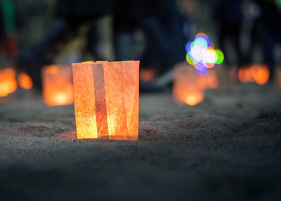 Close-up of illuminated lamp against blurred background