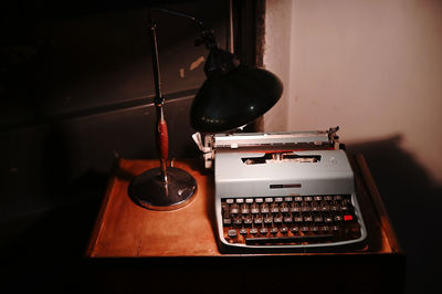 High angle view of old telephone on table