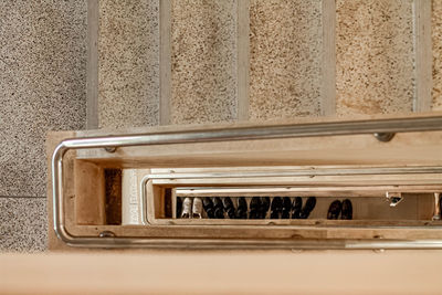 High angle view of old metal wall at home