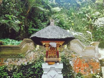 Entrance of temple against building