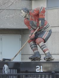 Low angle view of statue against building