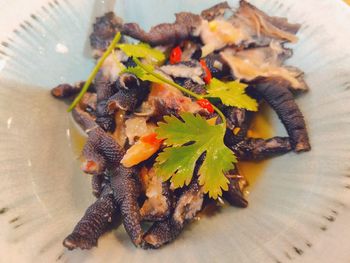 High angle view of fish in plate on table
