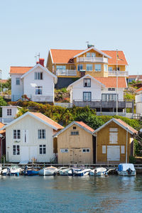 Houses and boats at the jetty on the coast