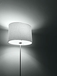 Close-up of electric lamp at home