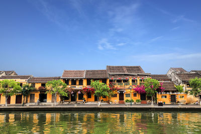 Hoian old town yellow building against blue sky