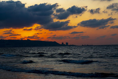 Scenic view of sea against sky during sunset