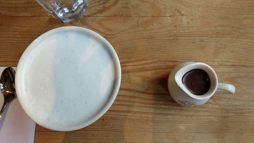 High angle view of coffee cup on table