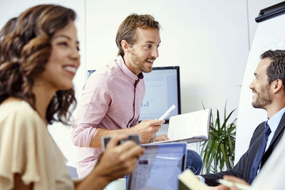 Co workers having a meeting in the office