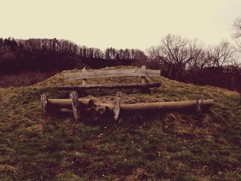 Wooden fence on grassy field
