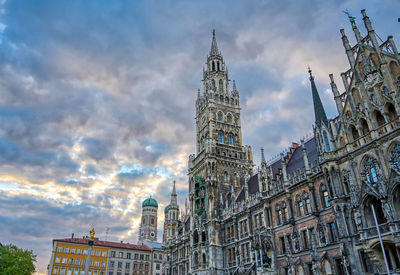 Low angle view of buildings in city against sky