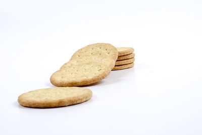 Close-up of cookies against white background