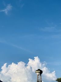Low angle view of water tower against sky