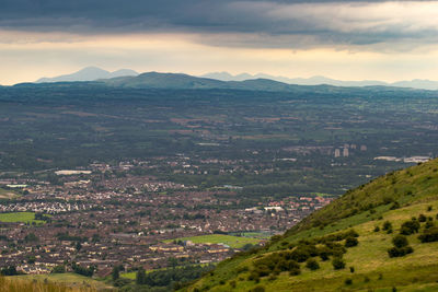 Aerial view of cityscape and mountains