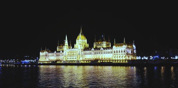 Illuminated city lit up at night