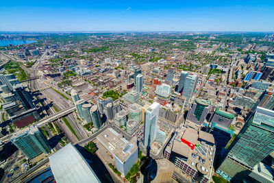High angle view of city buildings against sky