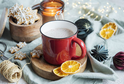 Cozy winter and christmas setting with hot cocoa and homemade cookies