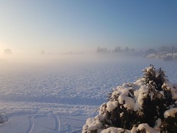 Scenic view of sea against sky during winter