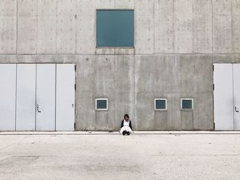 Full length of boy in city