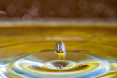 Close-up of drop splashing in water