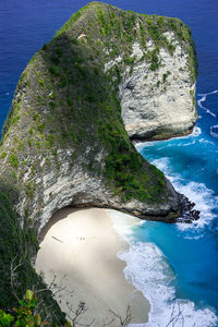 High angle view of rock formation in sea