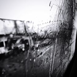 Close-up of wet window during rainy season