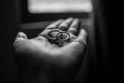Close-up of hand holding rings