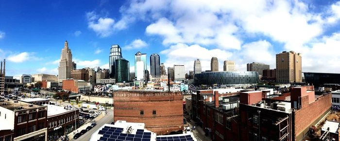 High angle view of city against cloudy sky