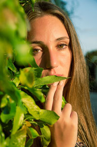 Close-up of young woman looking away