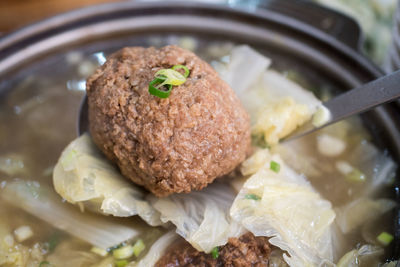 Close-up of meat in container