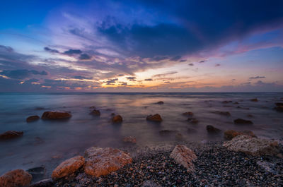 Scenic view of sea against sky during sunset