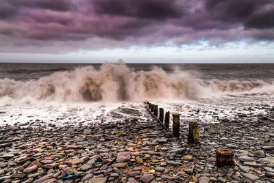 Scenic view of sea against cloudy sky