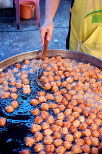 High angle view of person preparing food outdoors