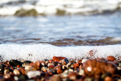 Close-up of pebbles on beach