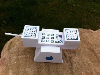 High angle view of artificial telephone on wood