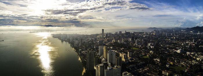 High angle view of city and buildings against sky