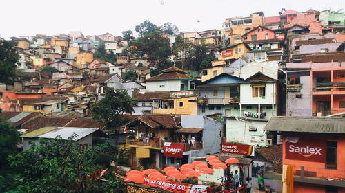High angle view of residential buildings in city